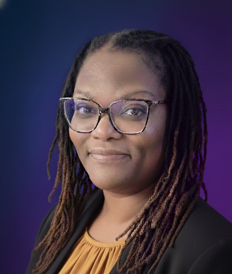 A headshot of Tasha Hussey smiling with a Purple and Blue background.