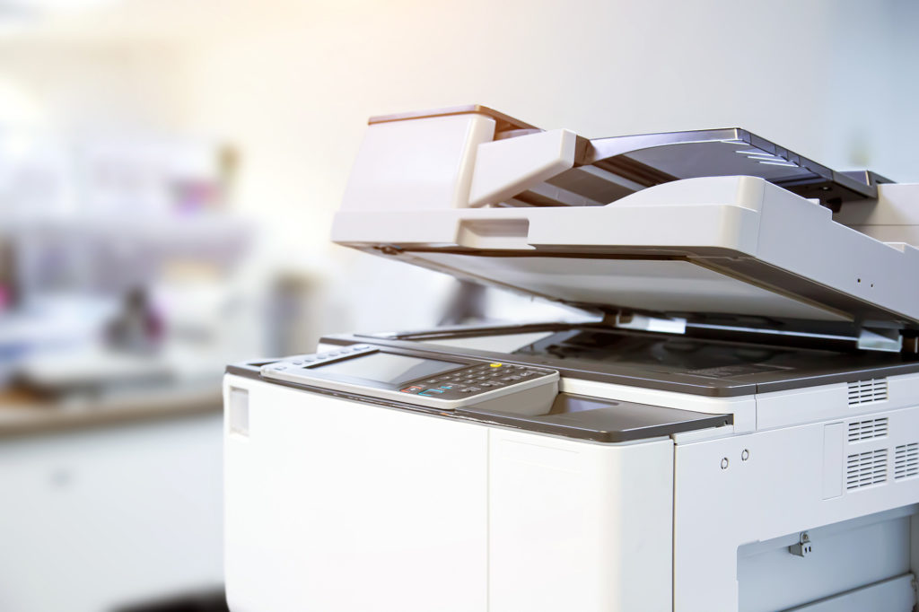 Copier printer, Close up the photocopier or photocopy machine office equipment workplace for scanner or scanning document and printing or copy paper duplicate and Xerox